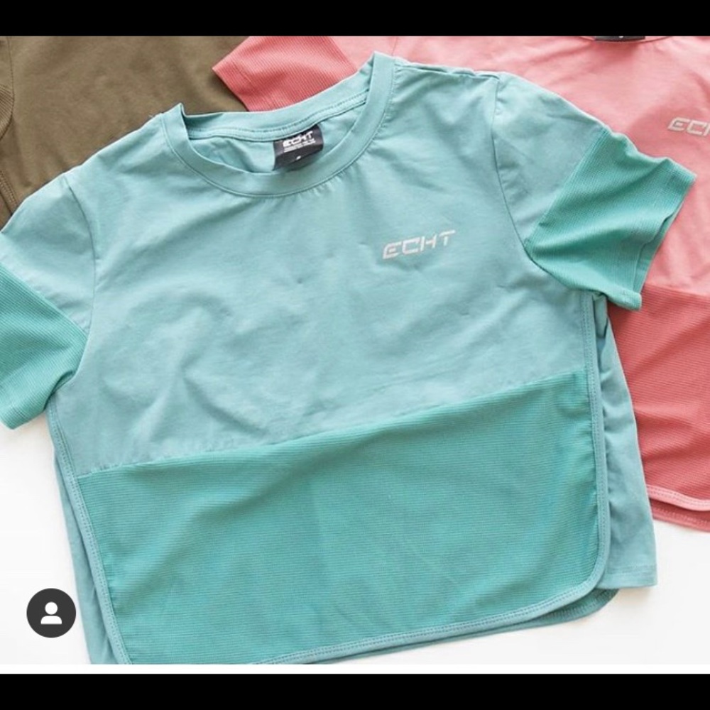 ECHT. Light blue/teal crop top tee. Never worn